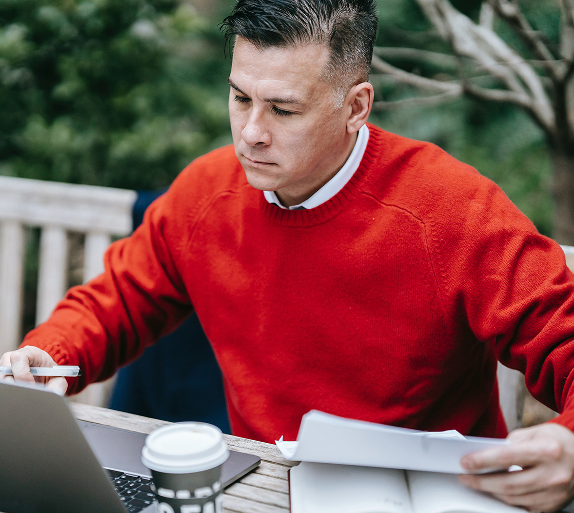 man filling in paperwork